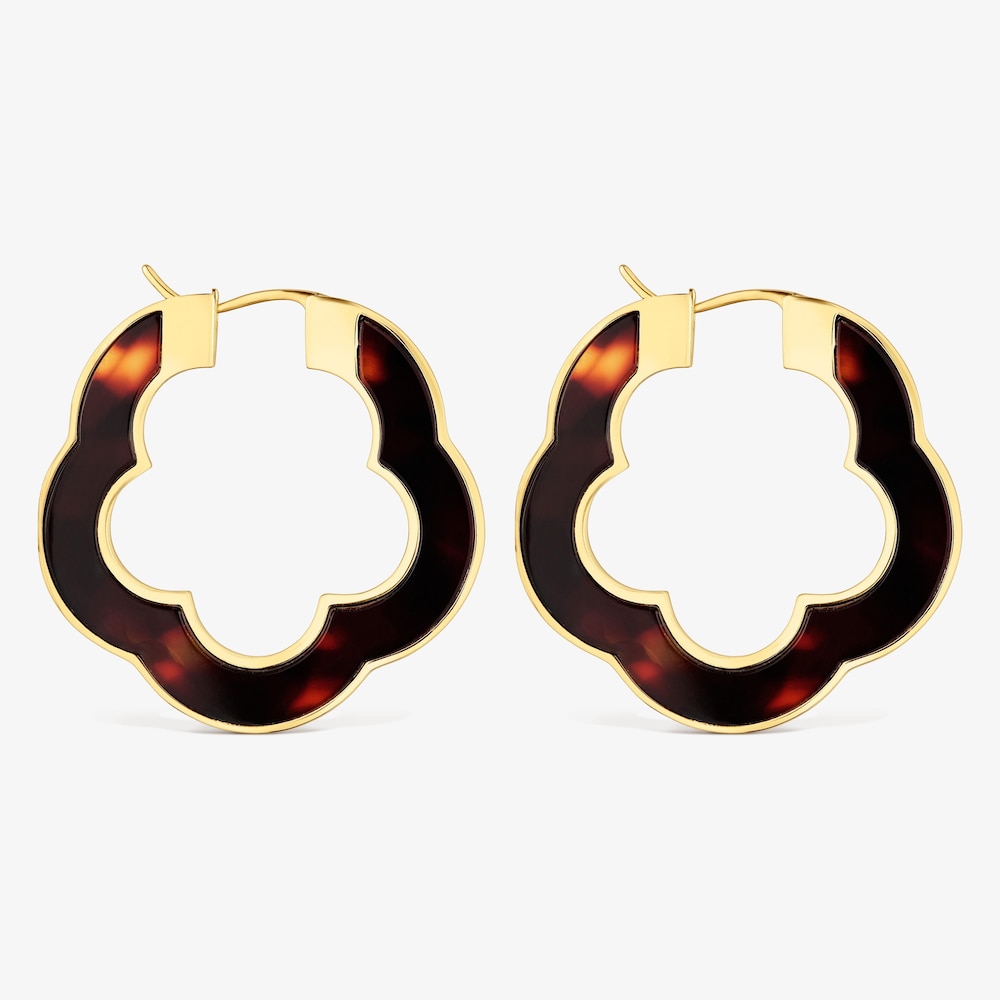 N&aacute;u&scaron;nice ve tvaru květiny o&nbsp;velikosti 33&nbsp;mm z&nbsp;oceli ve zlat&eacute; barvě a&nbsp;želvovinov&eacute; pryskyřice TOUS Galaxy