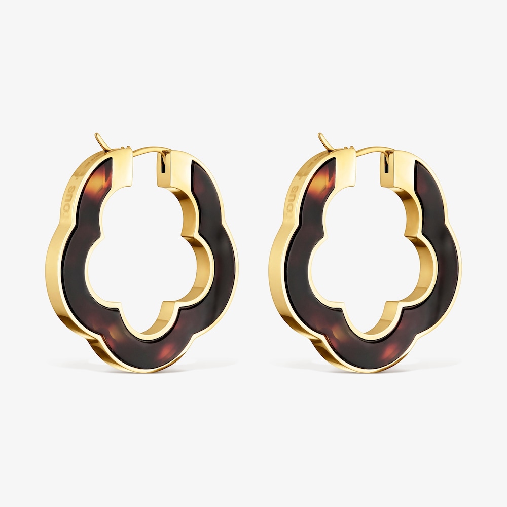 N&aacute;u&scaron;nice ve tvaru květiny o&nbsp;velikosti 33&nbsp;mm z&nbsp;oceli ve zlat&eacute; barvě a&nbsp;želvovinov&eacute; pryskyřice TOUS Galaxy