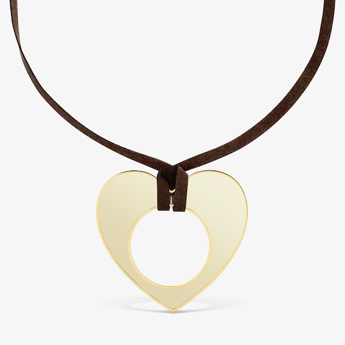 N&aacute;hrdeln&iacute;k so srdcom z&nbsp;ocele zlatej farby, bielej živice s&nbsp;čiernou &scaron;n&uacute;rkou TOUS Galaxy