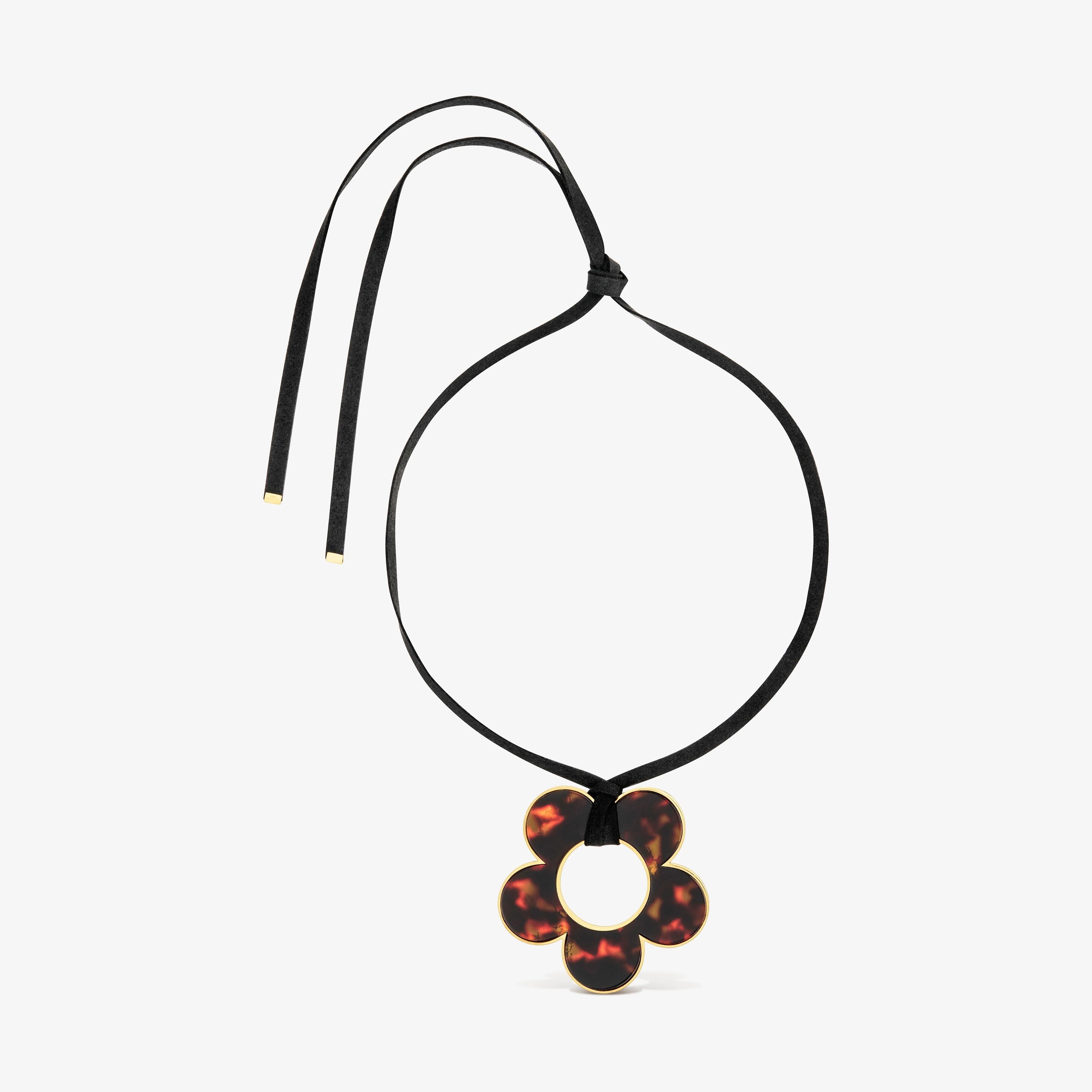 40 mm gold-colored steel, tortoiseshell resin and black cord
