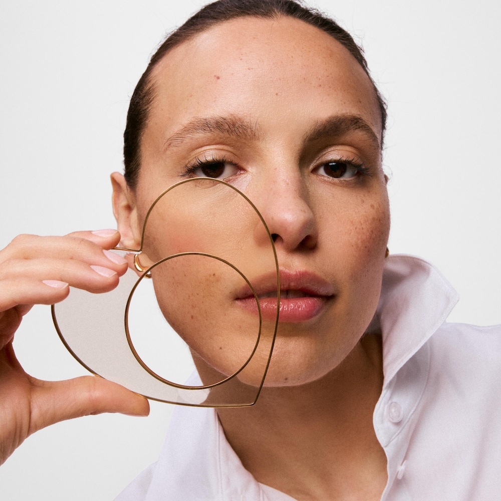 Bransoleta ze stali w kolorze złotym i białej żywicy z motywem serca TOUS Galaxy