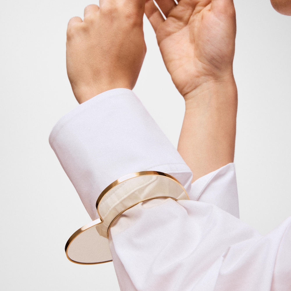 Bransoleta ze stali w kolorze złotym i białej żywicy z motywem serca TOUS Galaxy