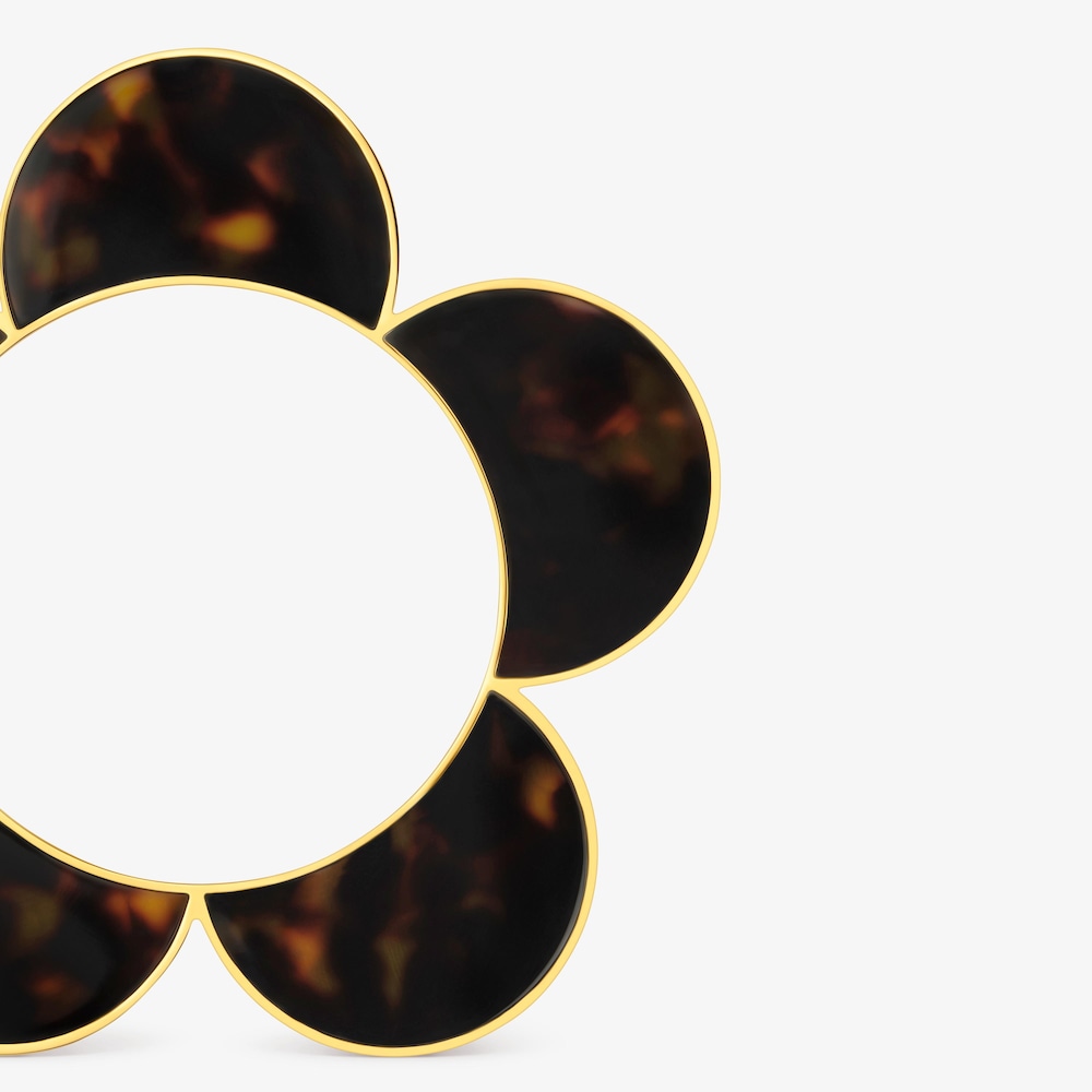 Pulsera esclava flor de acero dorado y resina carey Galaxy