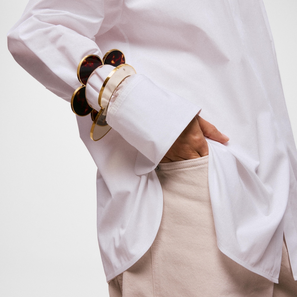 Pulsera esclava flor de acero dorado y resina carey Galaxy