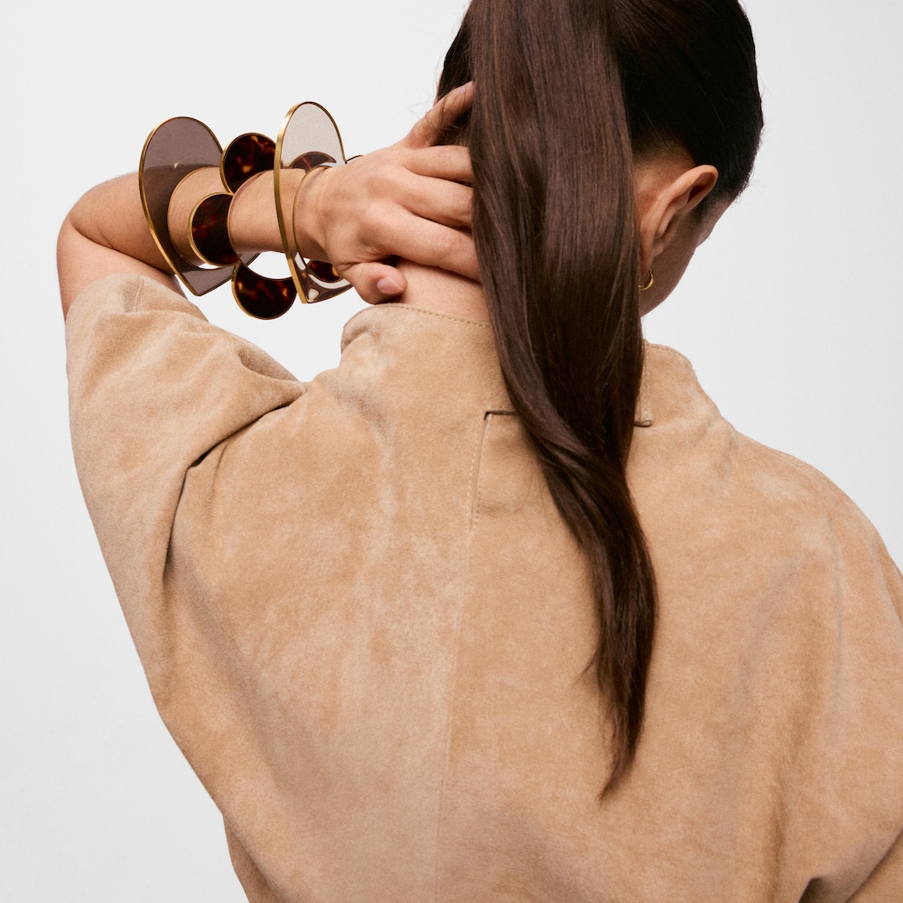 Bransoleta ze stali w kolorze złotym i czarnej żywicy z motywem serca TOUS Galaxy