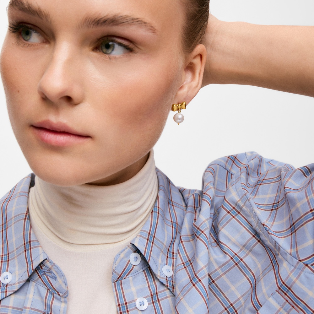 Pendientes lazo de acero dorado y perla cultivada TOUS Charming
