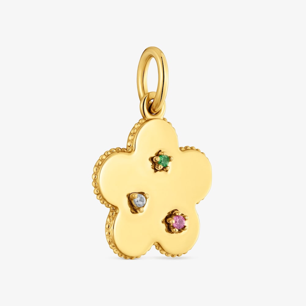 Dije flor de acero dorado y gemas Cachito M&iacute;o