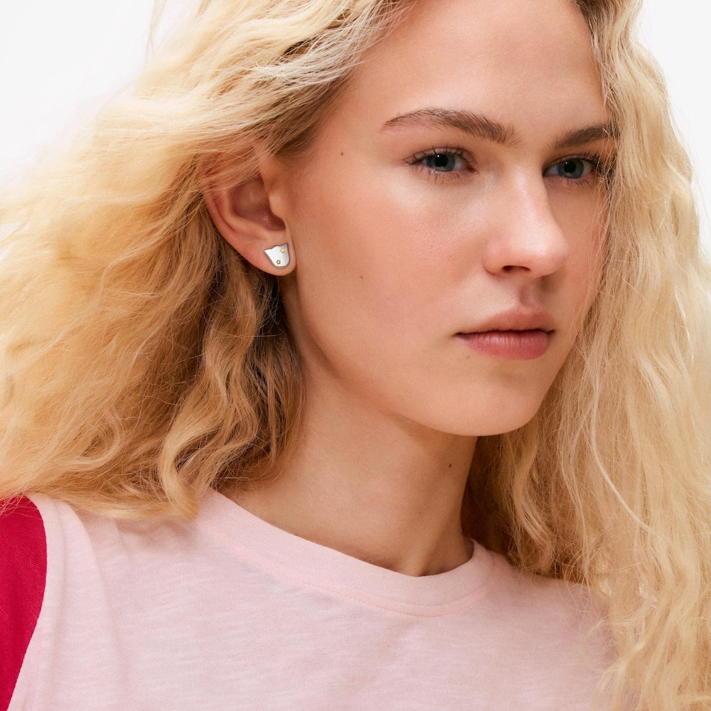 Aretes tulipa de acero bicolor Cachito M&iacute;o