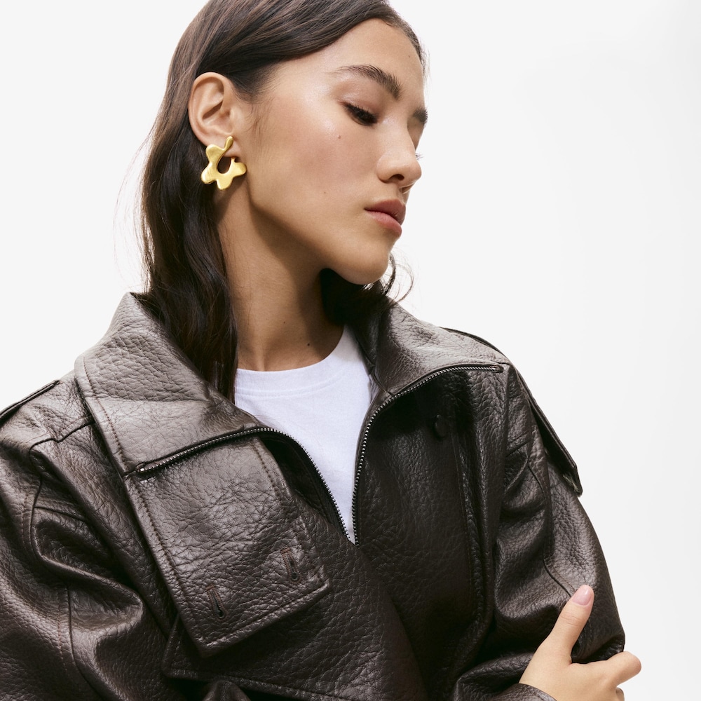 Long gold-colored steel flower Earrings TOUS Strain