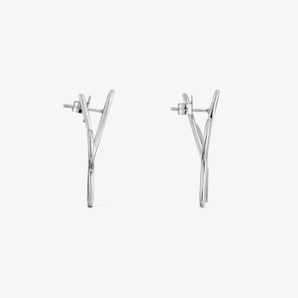 Boucles d&rsquo;oreilles S fleur en acier TOUS Strain