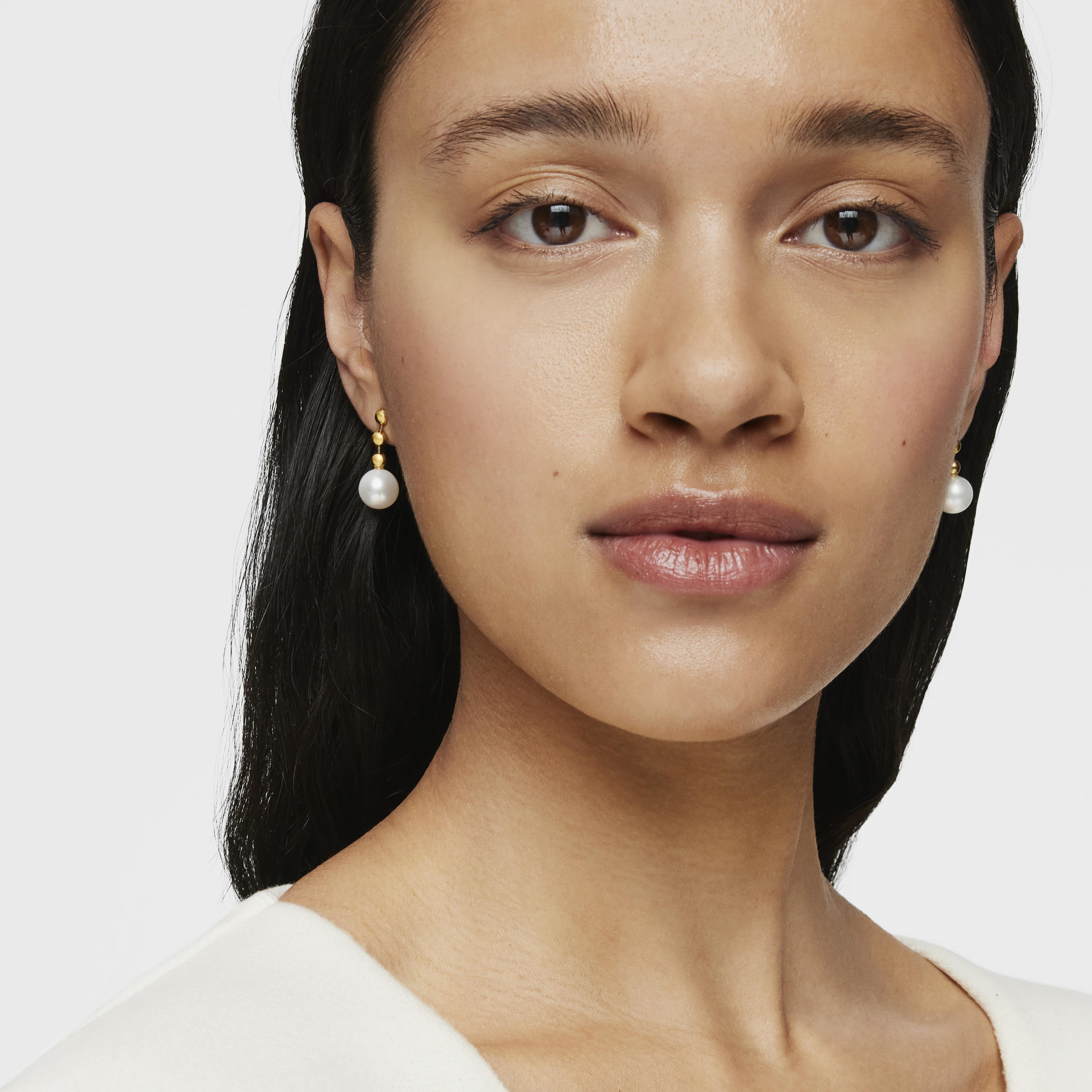 Pendientes cortos bolas con baño de oro 18 kt sobre plata y perla Gloss