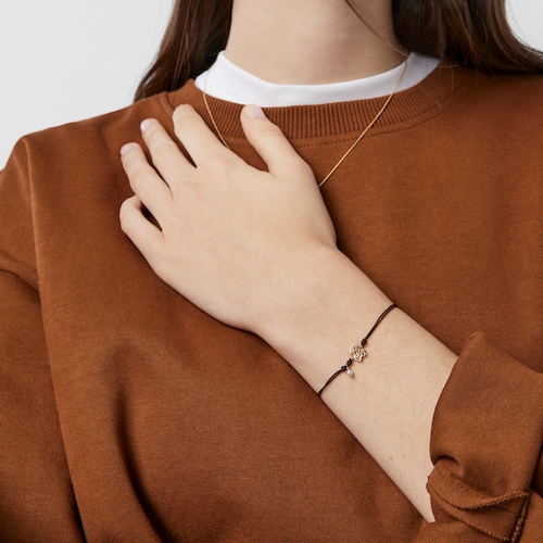 Pulsera Oceaan de oro, perla y cordón