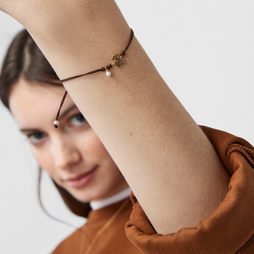 Pulsera Oceaan de oro, perla y cordón