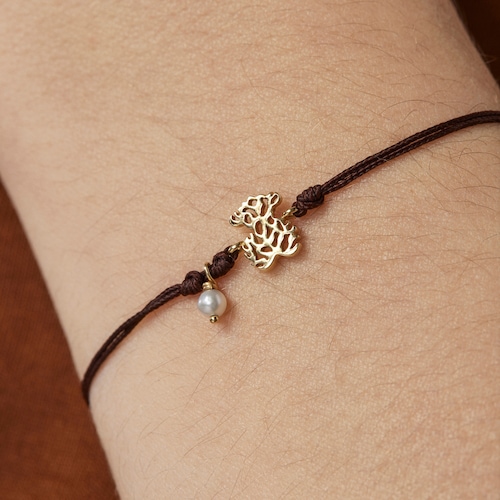 Pulsera Oceaan de oro, perla y cordón
