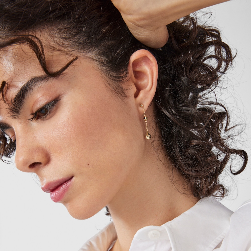 Long 18K solid gold Magic Nature Earrings with diamonds