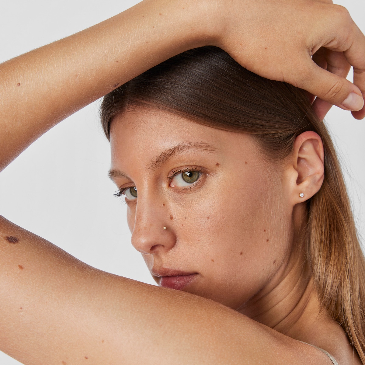 Gold TOUS Basics nose Piercing with diamond