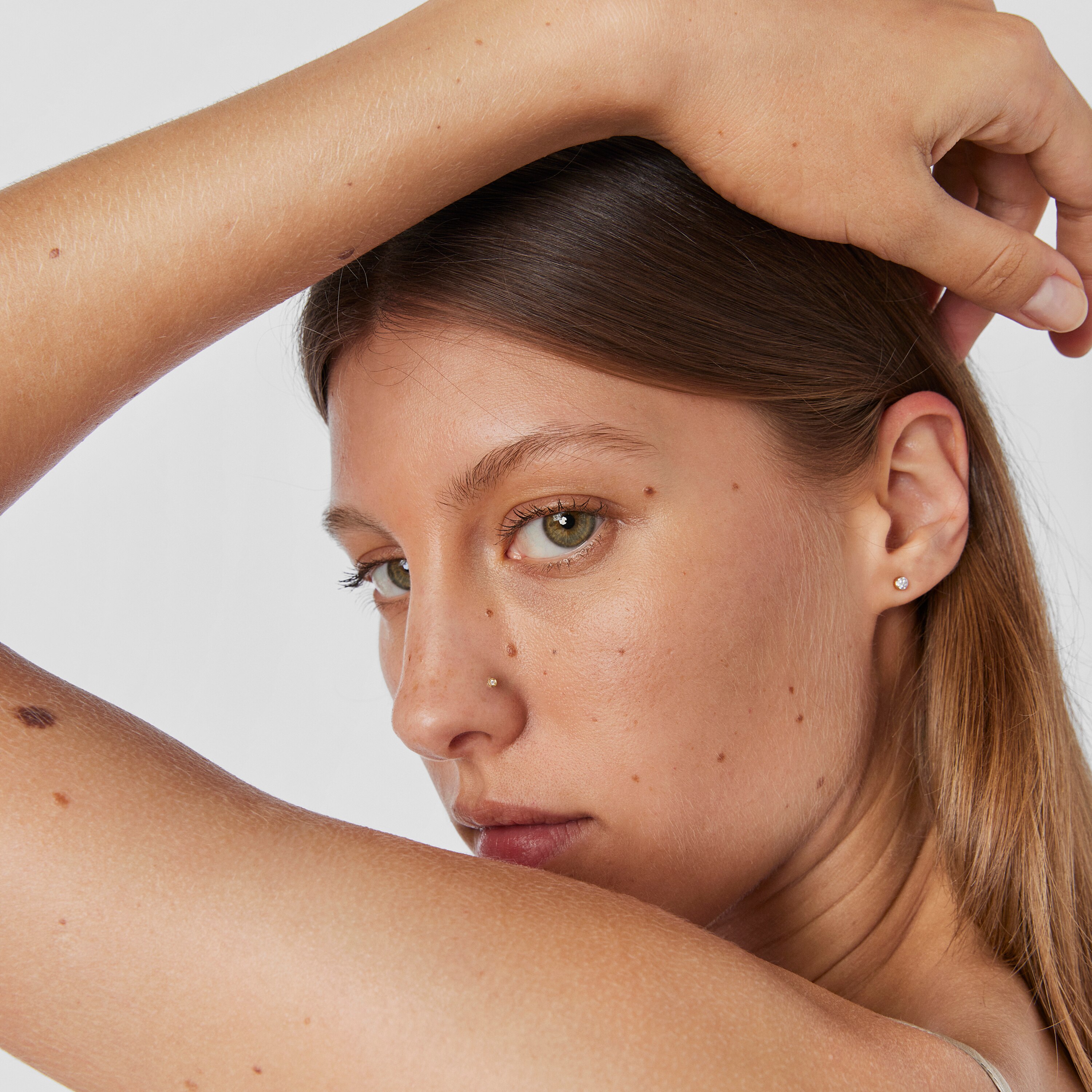 Gold TOUS Basics nose Piercing with diamond