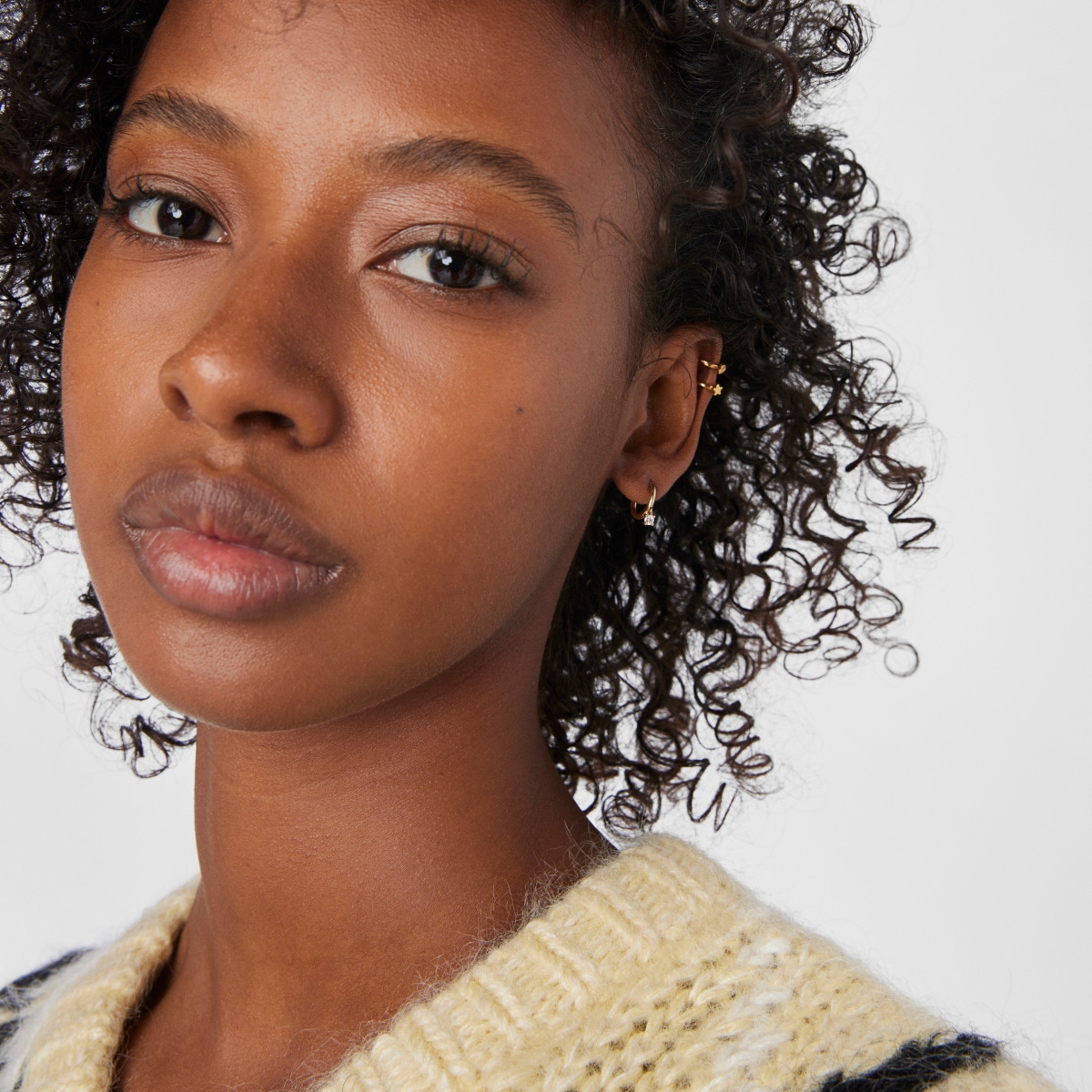 Gold-colored IP Steel TOUS Basics ear Piercing