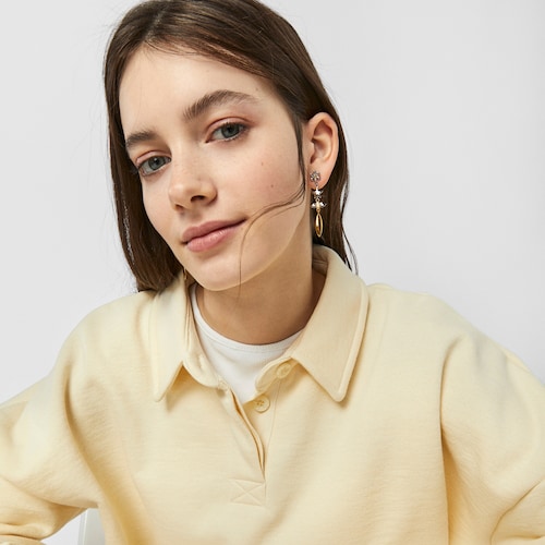 Long gold colored IP Steel Fragile Nature Earrings