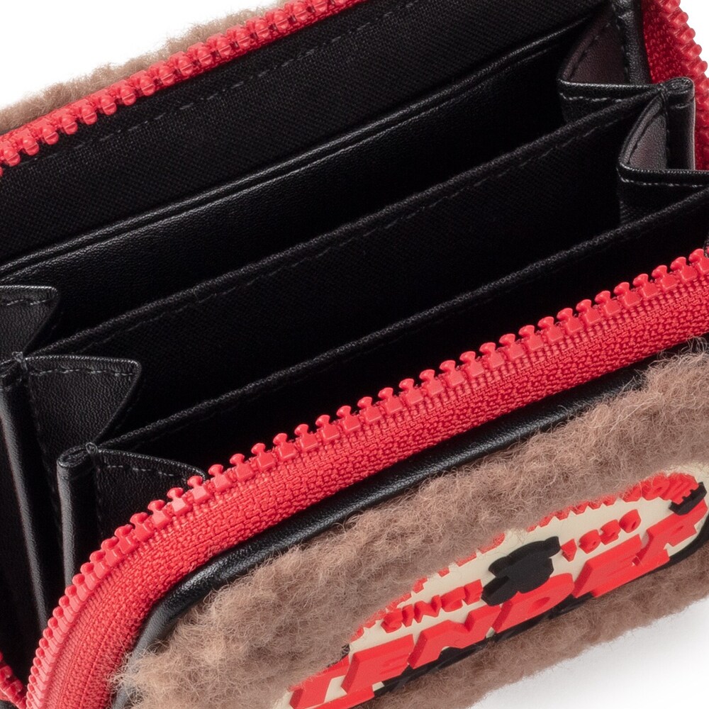 Medium taupe colored Amaya Joy Change purse