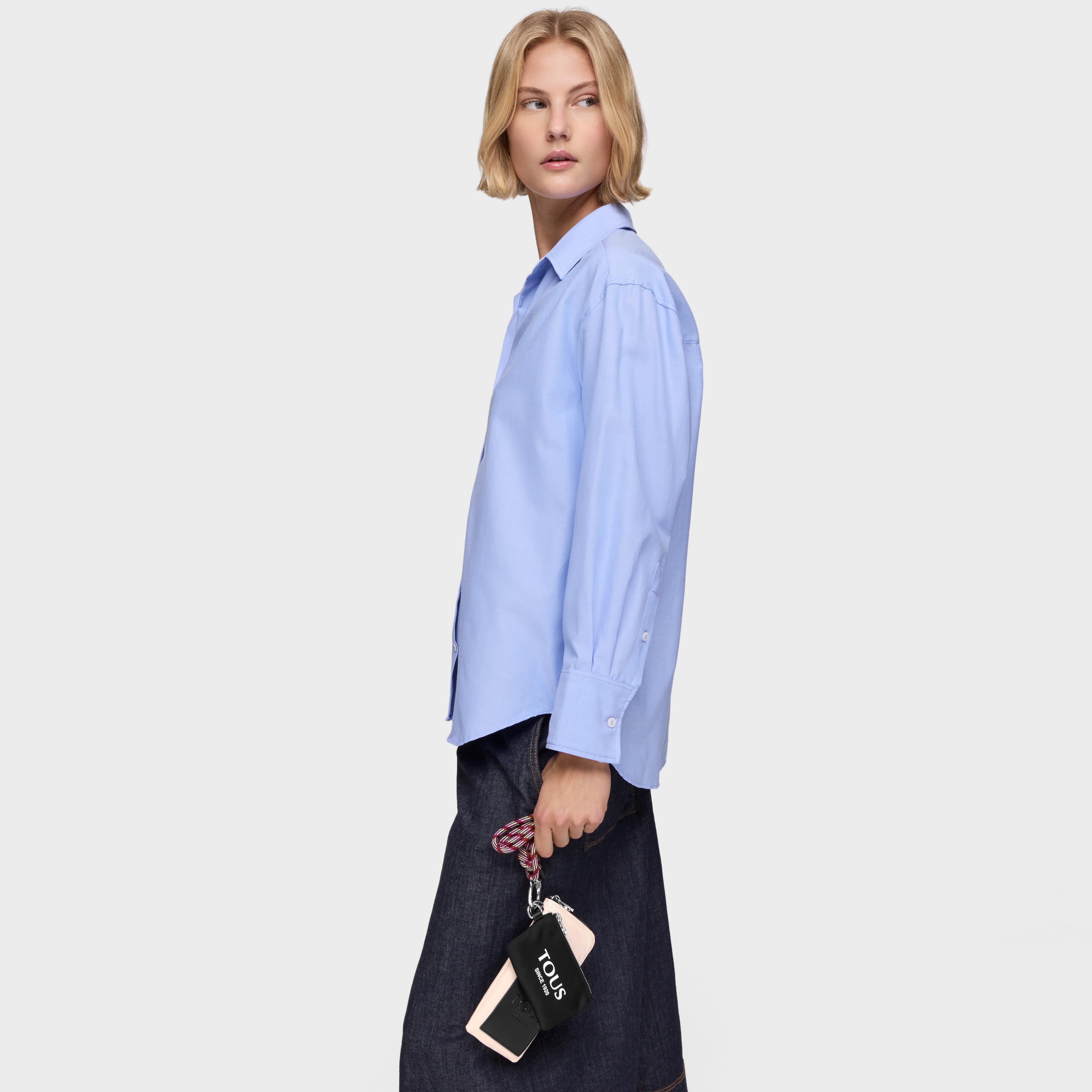 Mini black and nude colored Empire Soft Cellphone case and toiletry bag