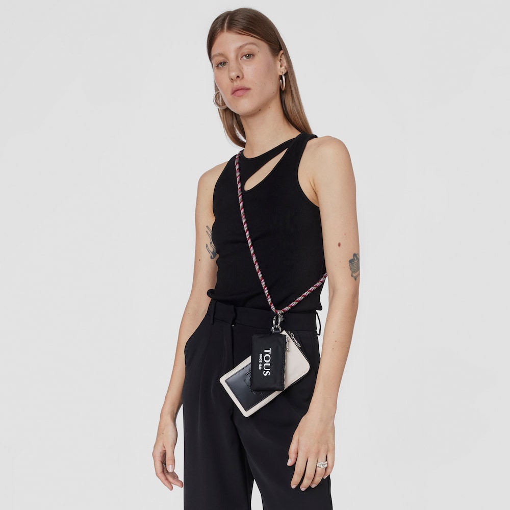 Mini black and nude colored Empire Soft Cellphone case and toiletry bag