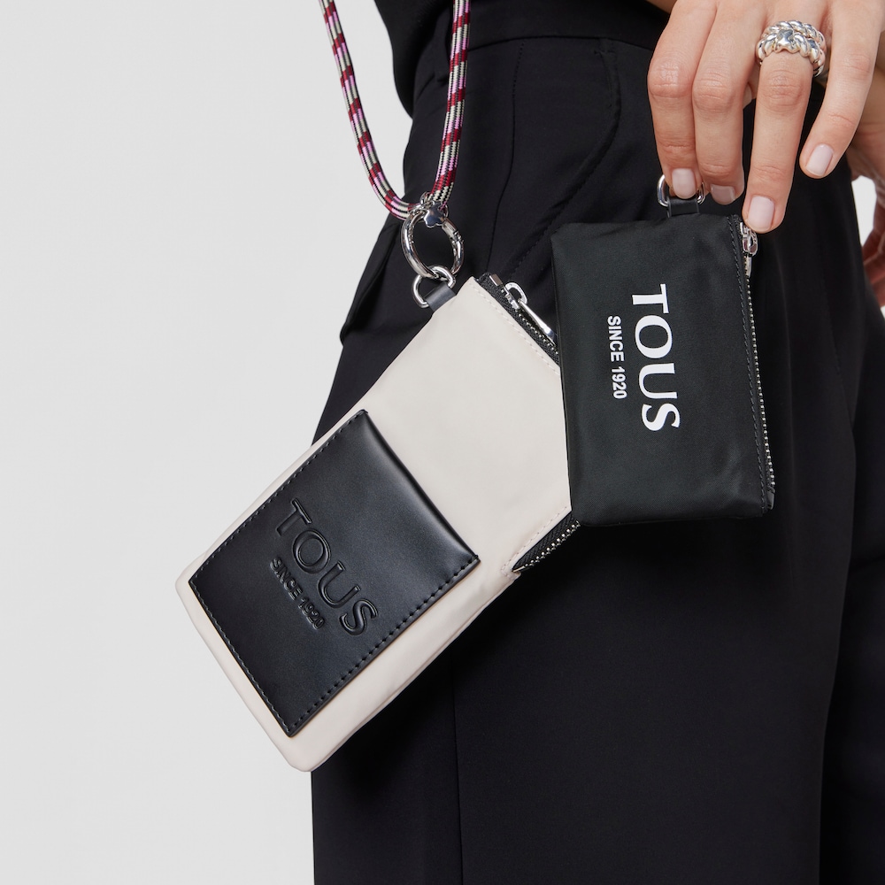 Mini black and nude colored Empire Soft Cellphone case and toiletry bag