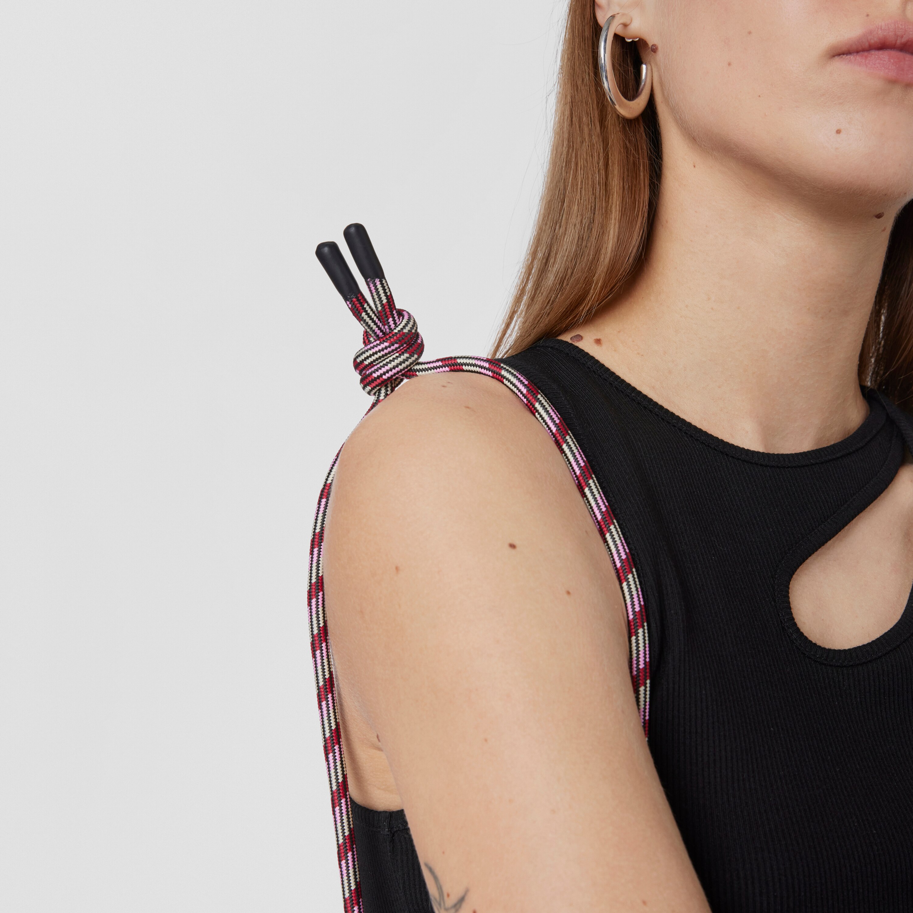 Mini black and nude colored Empire Soft Cellphone case and toiletry bag