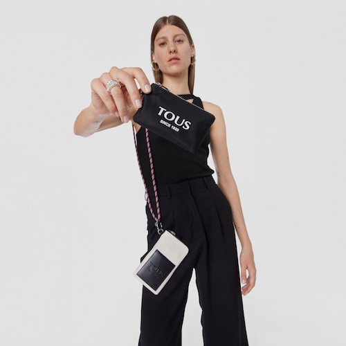 Mini black and nude colored Empire Soft Cellphone case and toiletry bag