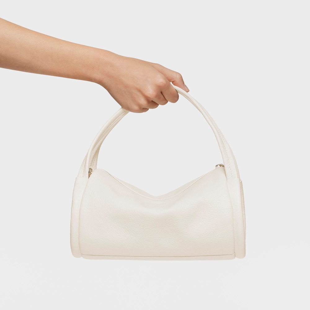 Bolso Duffle pequeño de piel beige TOUS Miranda image number 4