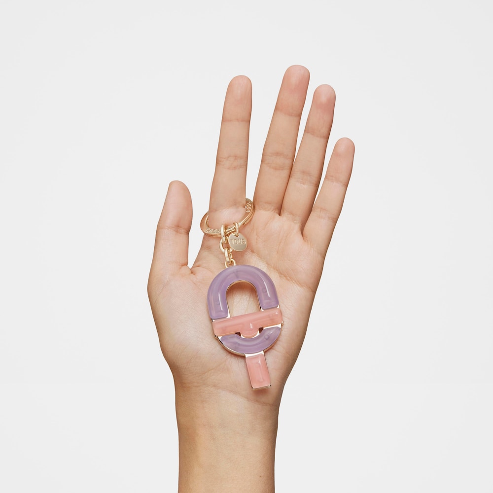 Llavero logo lila y rosa TOUS MANIFESTO