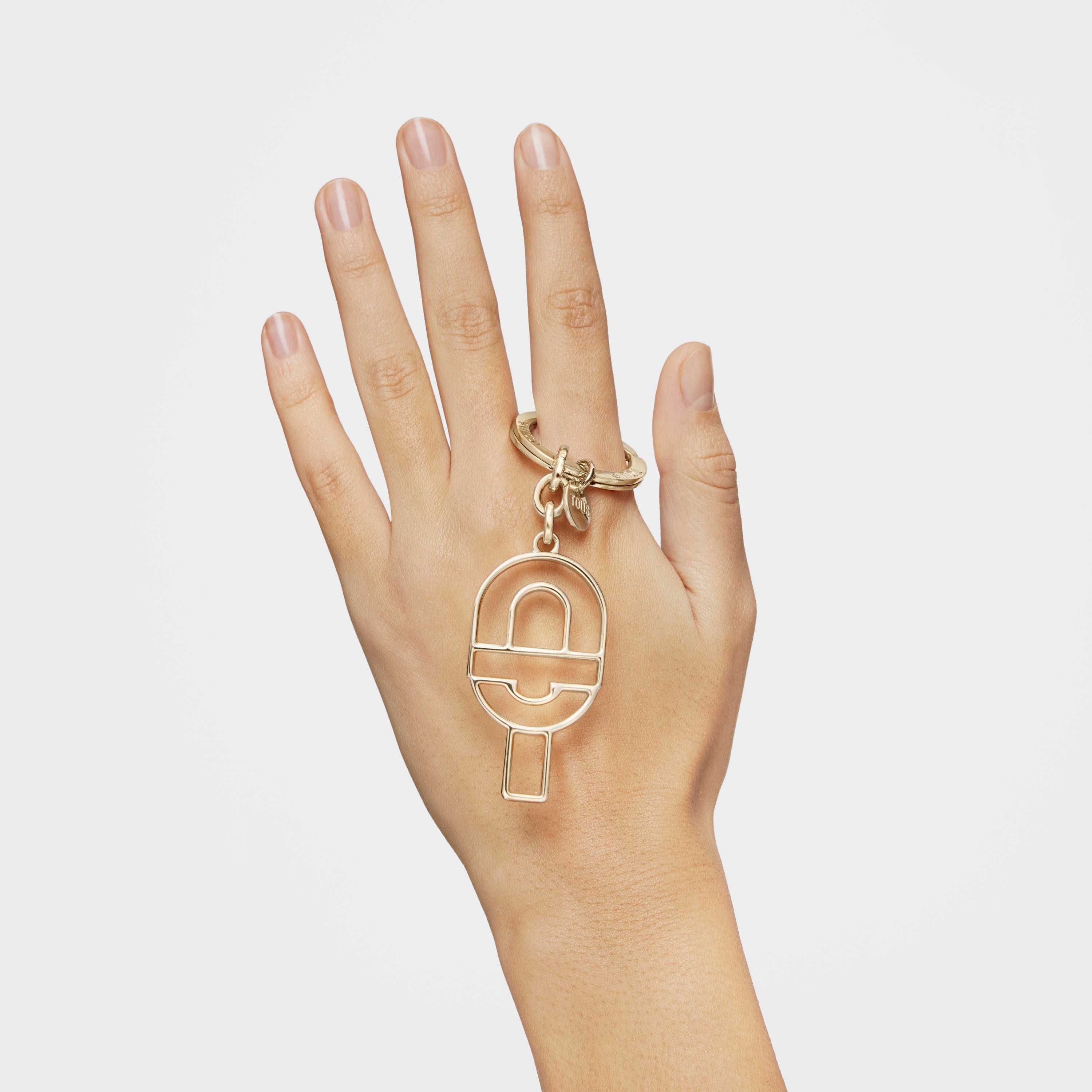 Key ring with gold-colored silhouette TOUS MANIFESTO