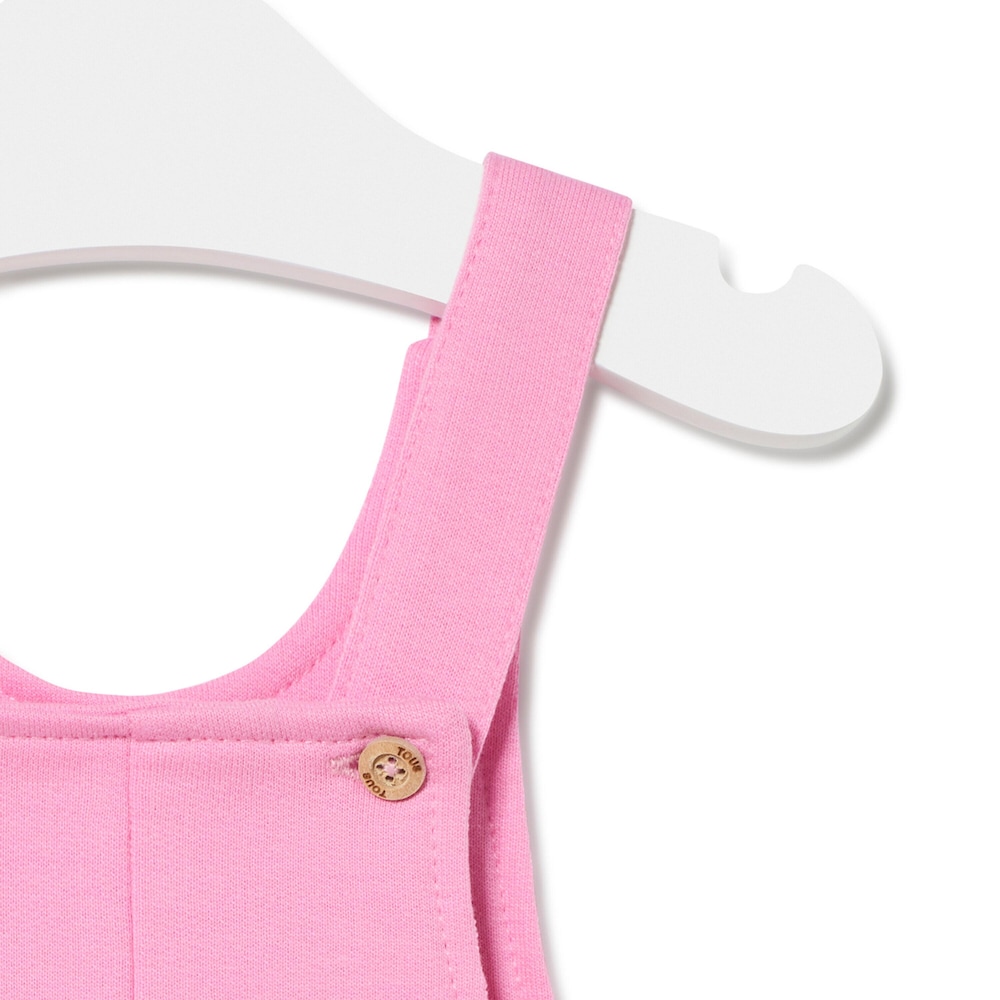 Dungarees-style baby romper in Classic pink