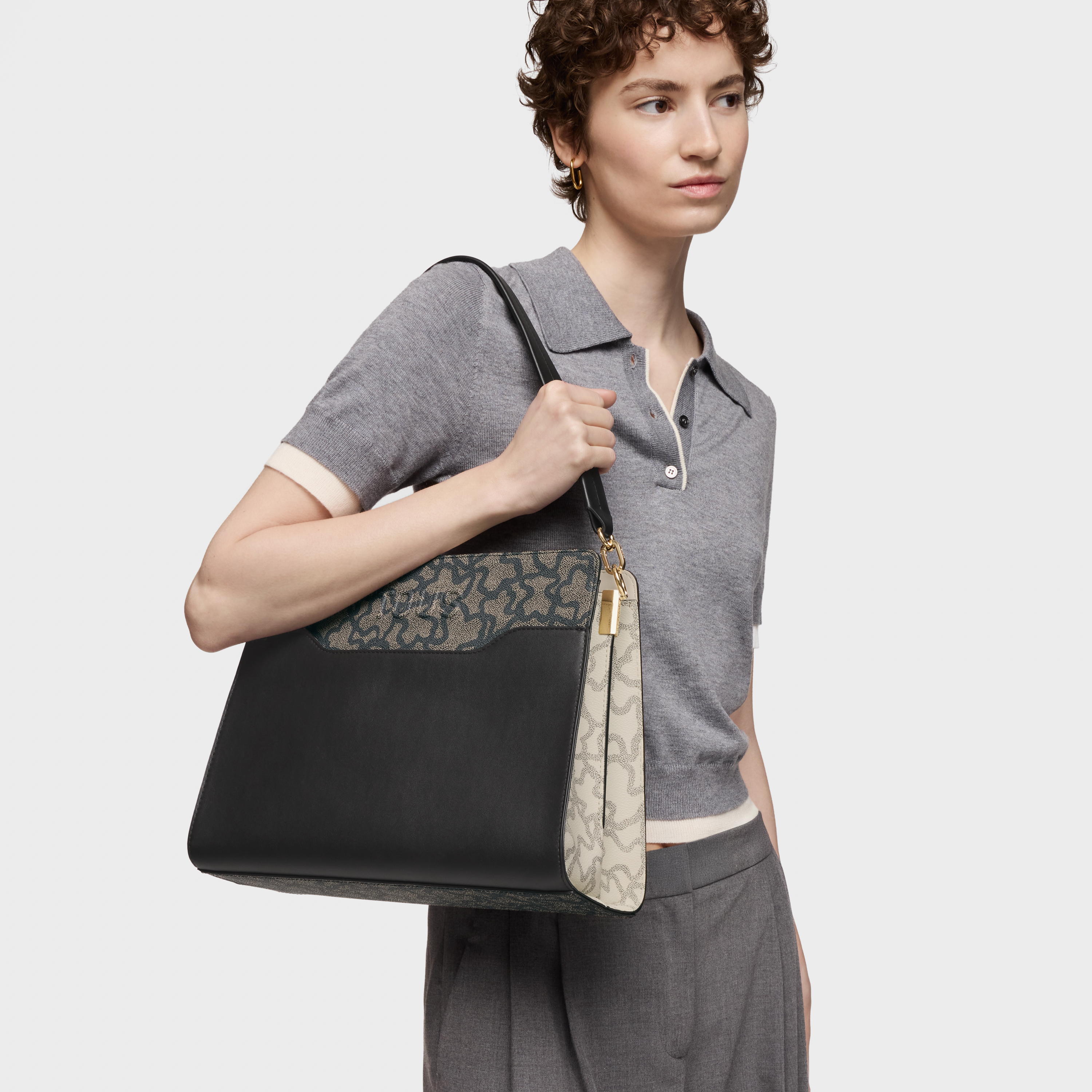 Medium black Shopping bag Kaos Icon