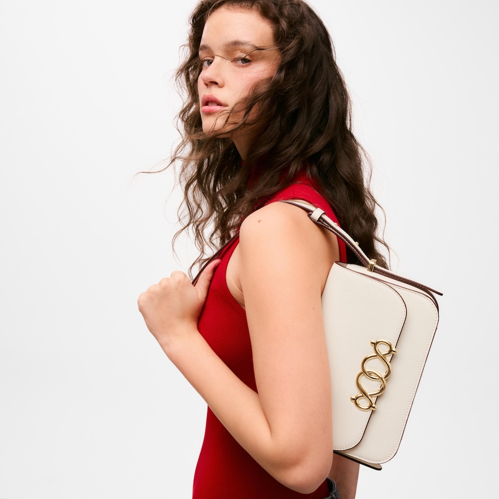 Medium beige Flap crossbody bag TOUS Infinity