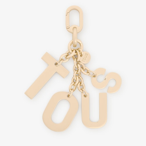 ゴールドカラーのキーホルダー TOUS Letters 