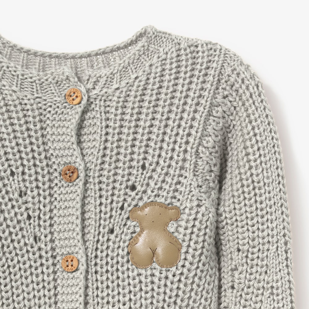 Grey knitted newborn baby romper