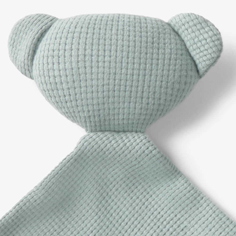 Green &lsquo;Const&rsquo; baby comforter