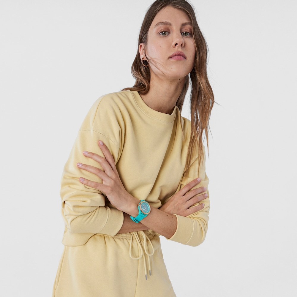 Reloj anal&oacute;gico solar turquesa Vibrant Sun