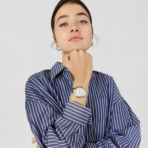 Reloj analógico con brazalete de acero S-Band