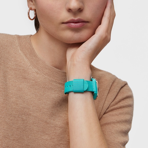 Turquoise solar-powered and sustainable Vibrant Sun Watch