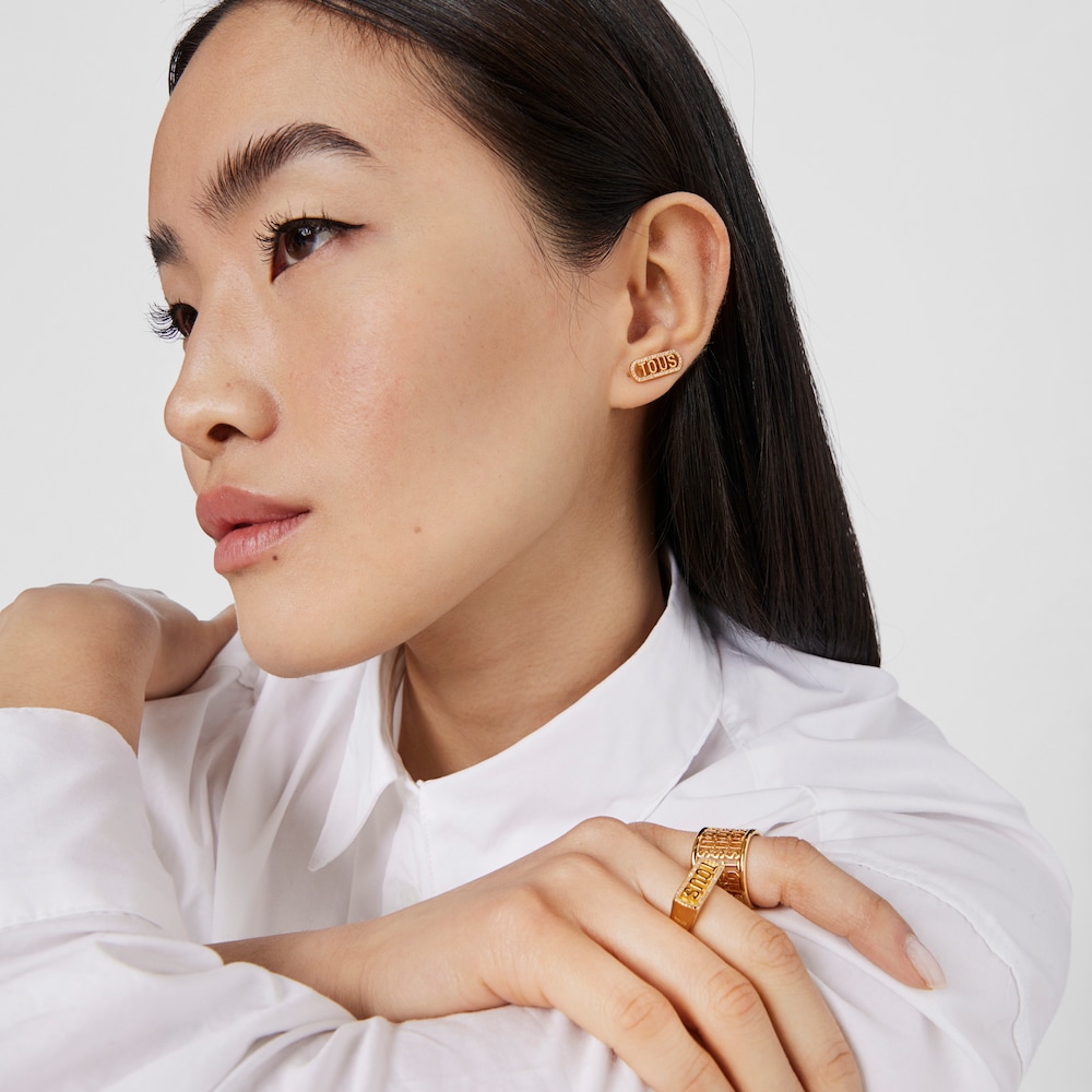 Pendientes trepadores con ba&ntilde;o de oro 18 kt sobre plata y diamantes Logo