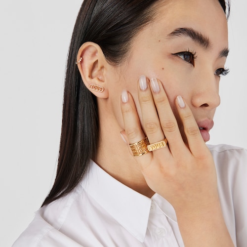 Pendientes trepadores con baño de oro 18 kt sobre plata y diamantes Logo