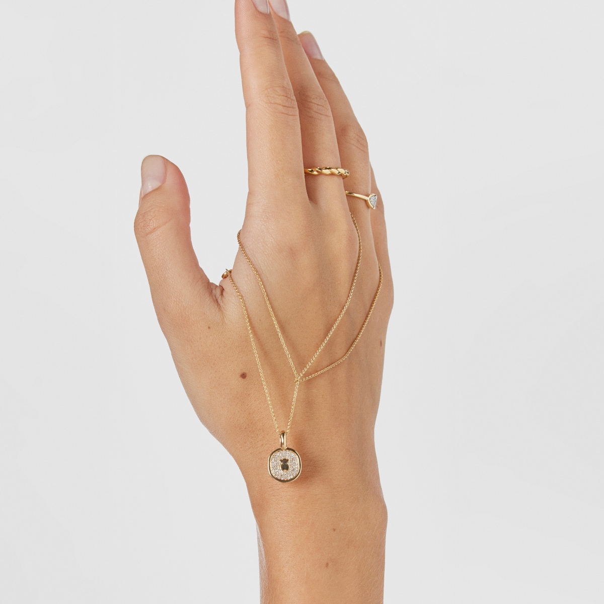 Gold Oursin Pendant with 0,21ct diamonds image number 5