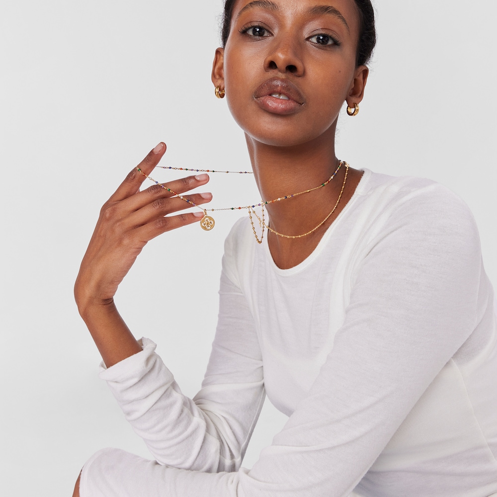 Collar rosario con ba&ntilde;o de oro 18 kt sobre plata y gemas y motivo cruz Tamara Falc&oacute; X TOUS