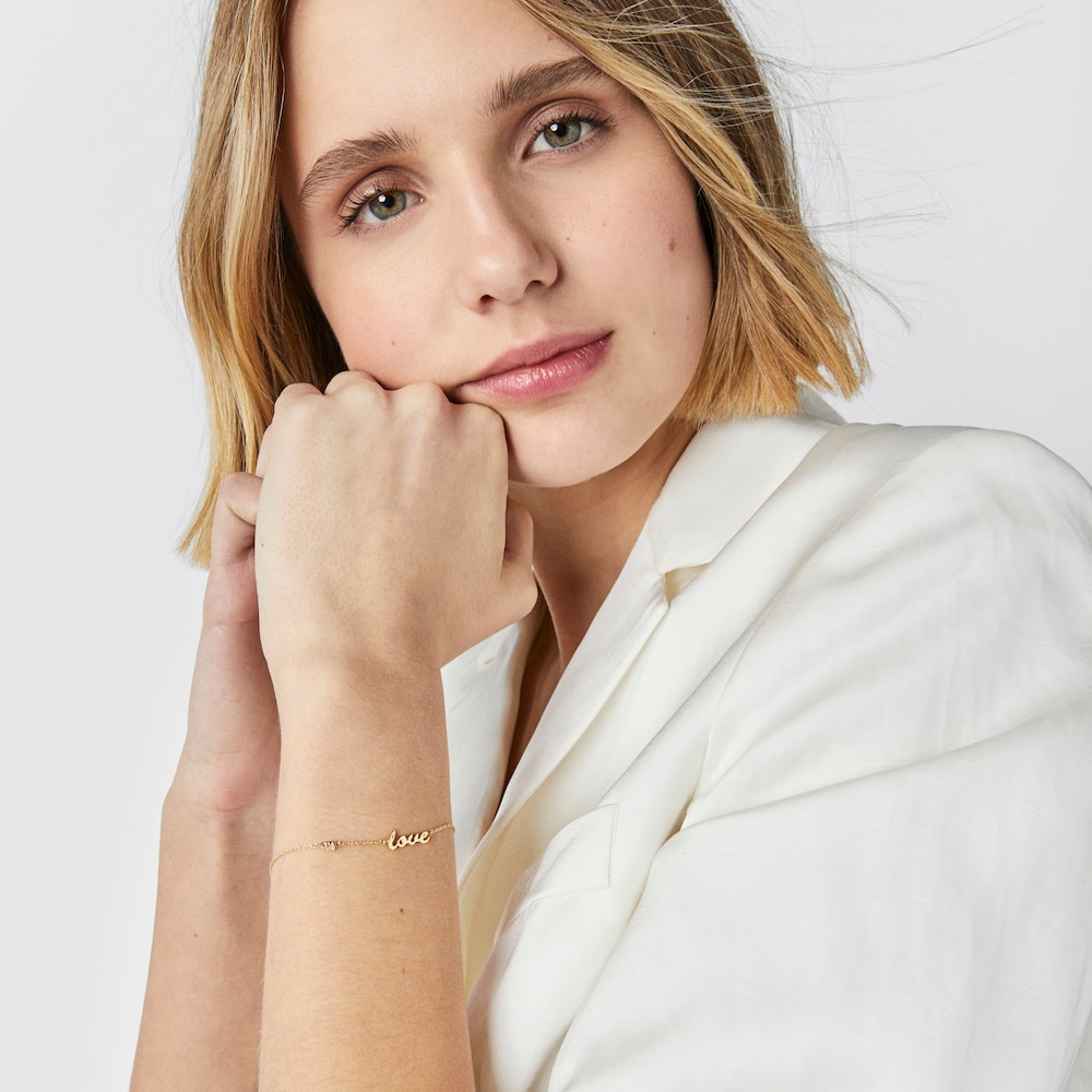 Złota bransoletka z diamentem i motywem Love