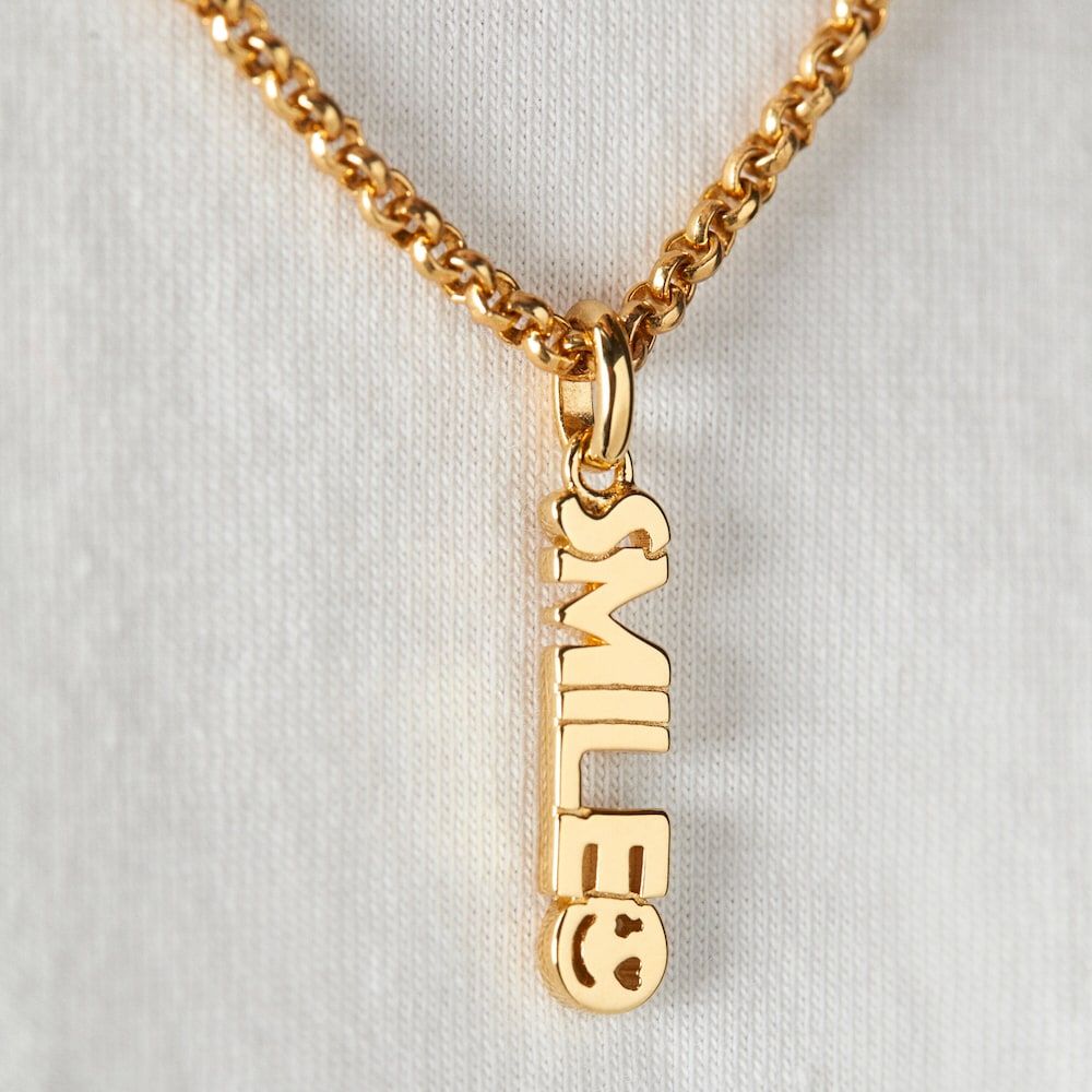Colgante Smile con ba&ntilde;o de oro 18 kt sobre plata TOUS Crossword