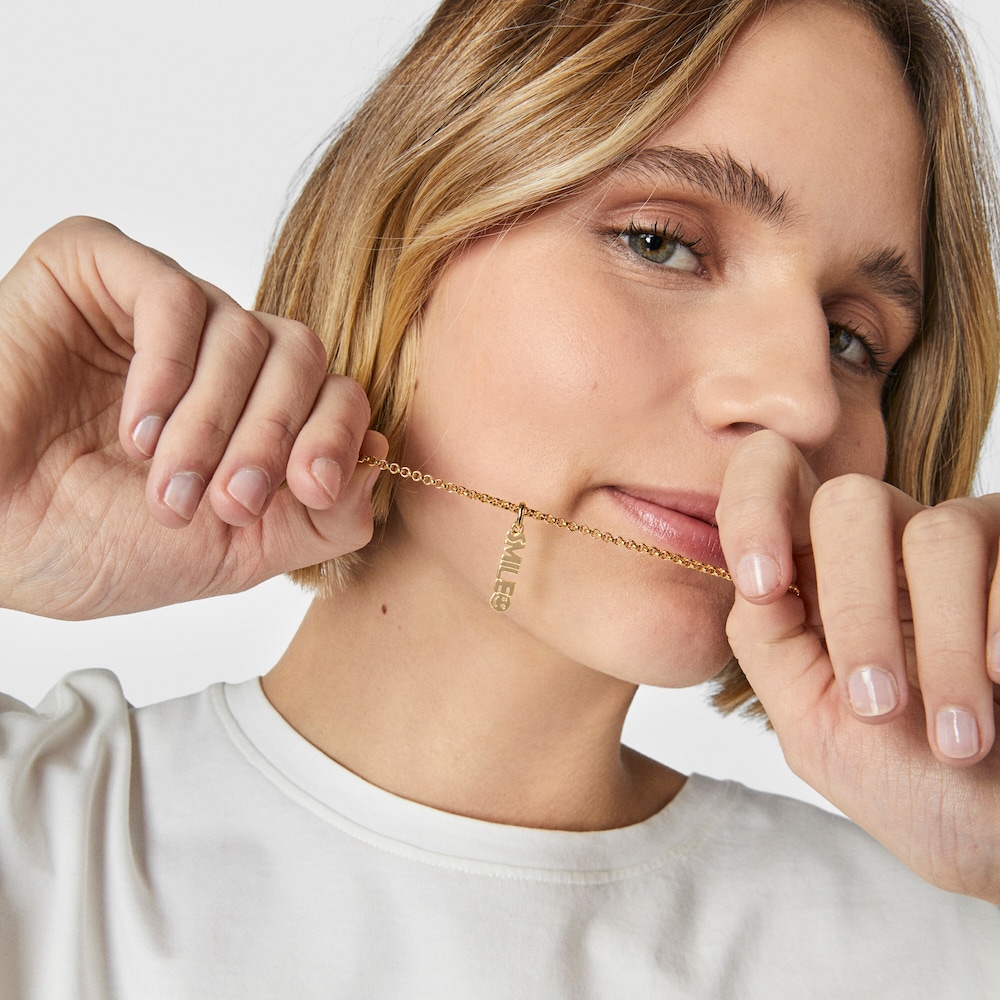 Colgante Smile con ba&ntilde;o de oro 18 kt sobre plata TOUS Crossword