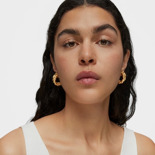 Brincos duplos Twisted