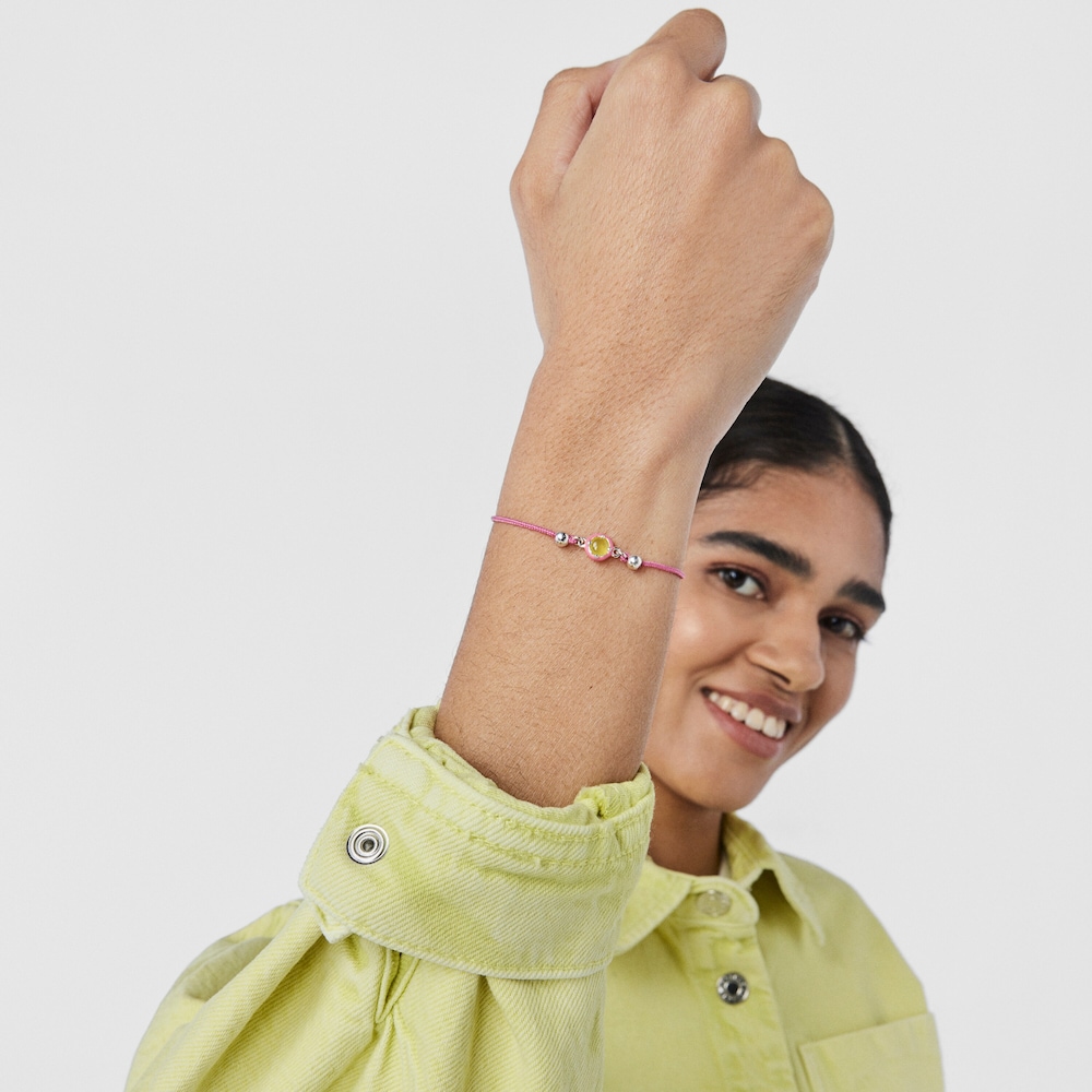 Bra&ccedil;alet TOUS Vibrant Colors de cord&oacute; rosa amb calced&ograve;nia i esmalt